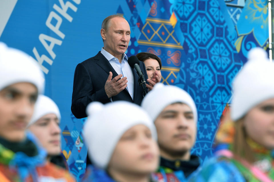 Russian President Vladimir Putin speaks while visiting the Coastal Cluster Olympic Village ahead of the 2014 Winter Olympics on Wednesday, Feb. 5, 2014, in Sochi, Russia. (AP Photo/Pascal Le Segretain, Pool)