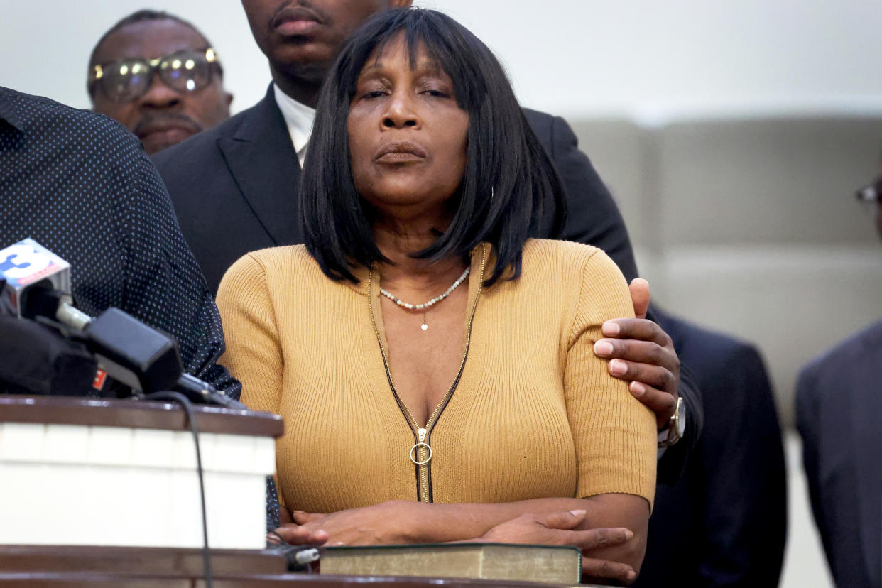 RowVaughn Wells, mother of Tyre Nichols, is comforted during a press conference on Jan. 27, 2023. in Memphis, Tenn. 