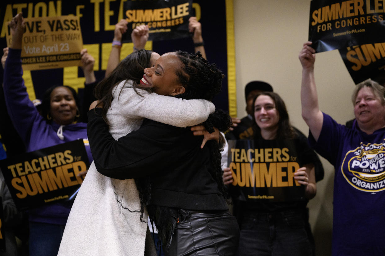 Rep. Alexandria Ocasio-Cortez (D-N.Y.), left, embraces Rep. Summer Lee (D-Pa.) during a campaign event for Lee at the Pittsburgh Federation Of Teachers headquarters in Pittsburgh on Sunday, April 21, 2024. (Jeff Swensen/The New York Times)