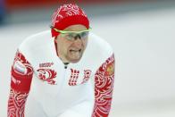 Russia's Aleksey Yesin reacts after the men's 500 metres speed skating race at the Adler Arena during the 2014 Sochi Winter Olympics February 10, 2014. REUTERS/Laszlo Balogh (RUSSIA - Tags: OLYMPICS SPORT SPEED SKATING)