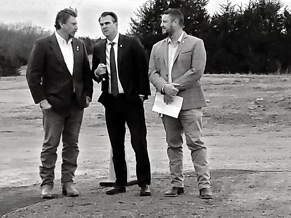 Tim Gatz, Gov. Kevin Stitt and Oklahoma Turnpike Authority Deputy Director Joe Echelle attend an ACCESS Oklahoma project groundbreaking on Thursday.