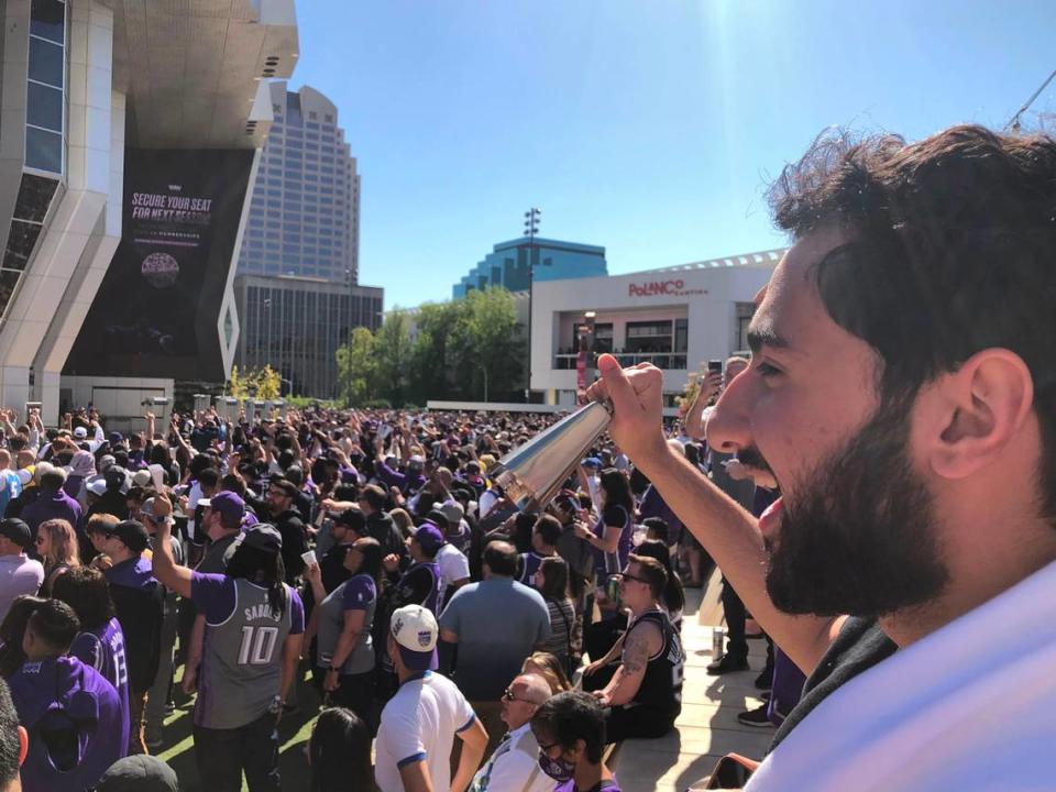 Zaid Alzanoon of Roseville rings his cowbell in front of Golden 1 Center before the Sacramento Kings play the Golden State Warriors in the first game of their NBA playoffs series on Saturday, April 15, 2023.
