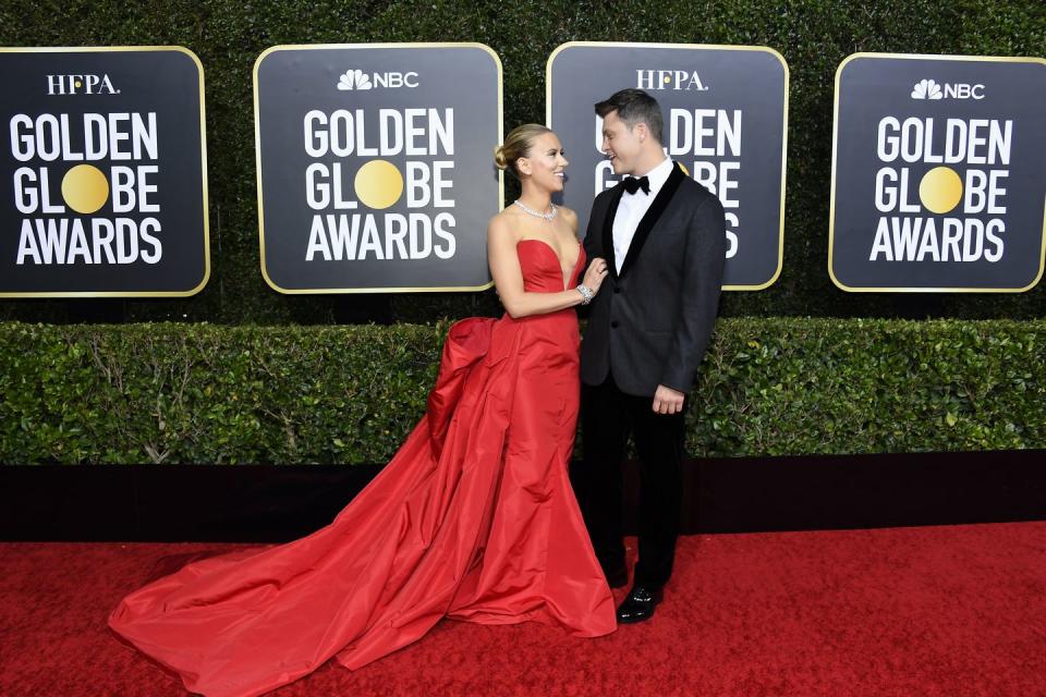 <p>The engaged couple dazzled on the red carpet at the Beverly Hilton Hotel for the <a href="https://www.elle.com/uk/fashion/g25746956/golden-globes-best-red-carpet-looks/" rel="nofollow noopener" target="_blank" data-ylk="slk:Golden Globes;elm:context_link;itc:0;sec:content-canvas" class="link ">Golden Globes</a>, at which point Johansson's movie Marriage Story was nominated for six awards. </p><p>Johansson donned a vivid red Vera Wang gown with a voluminous train. </p>