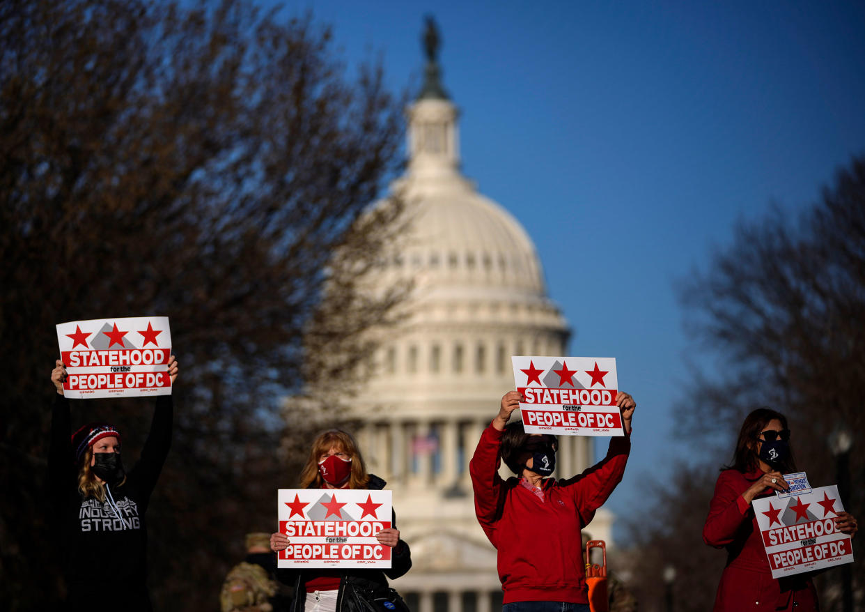 Residents of D.C.rally for statehood near the Capitol in Washington on March 22, 2021.