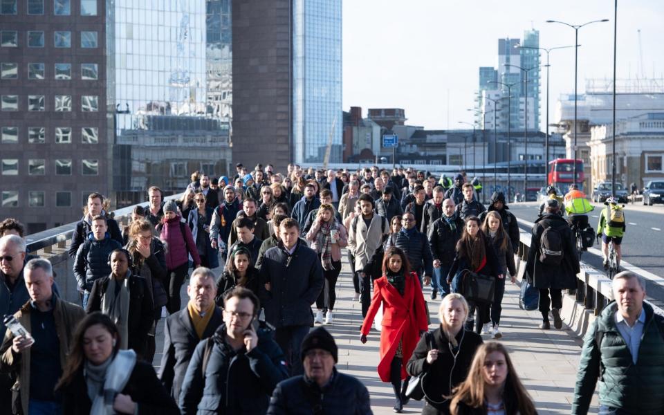 File photo dated 13/03/2020 of commuters crossing London Bridge, in central London, during the morning rush hour prior to lockdown. Extra training is required to deal with the "many thousands" of redundancies being predicted as furlough support tapers off, the British Chamber of Commerce has said. Issue date: Sunday August 1, 2021. PA Photo. A survey of businesses found that one in five firms plan on letting staff go in response to Sunday's furlough policy change, which will see employers asked to contribute 20% towards the salaries of those whose wages are currently being subsided by the state. The furlough scheme has seen staff whose jobs have been put on hold during the coronavirus pandemic guaranteed 80% of their salaries â€“ to a limit â€“ from the Government. See PA story ECONOMY Furlough. - PA