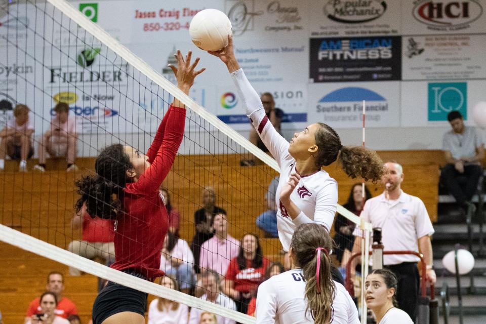 Chiles junior middle blocker Delaney Scott-Hanowell (6) tips the ball. The Chiles Timberwolves defeated the Leon Lions 3-1 on Tuesday, Oct. 4, 2022.