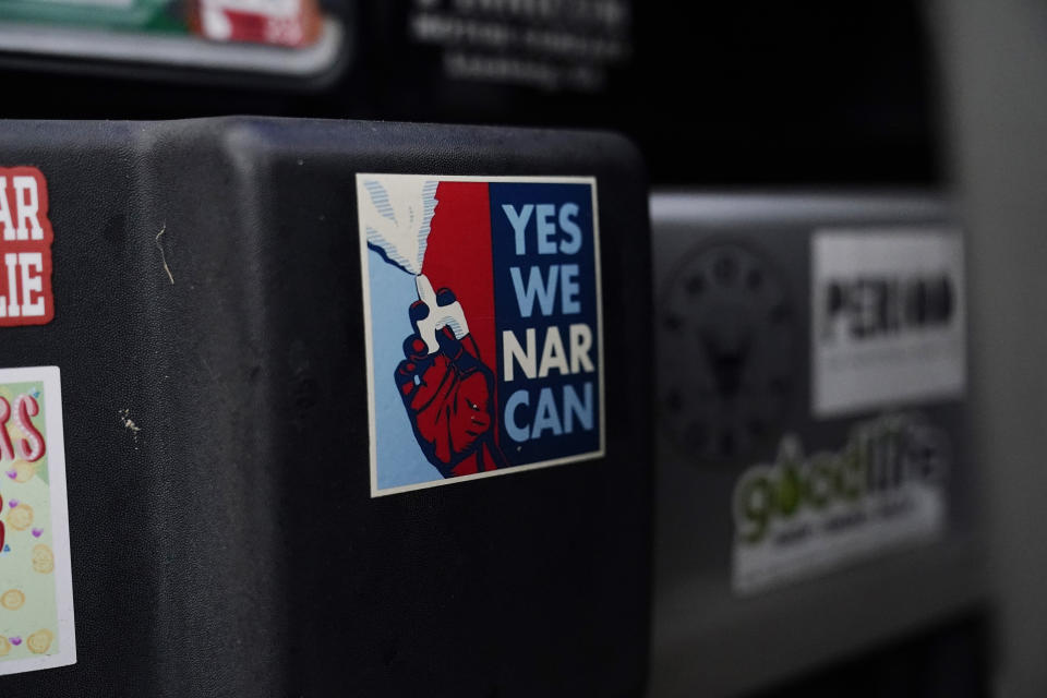 FILE - Jessie Blanchard's jeep bumper shows a sticker with the slogan "Yes We Narcan," Jan. 23, 2023, in Albany, Ga. Naloxone, available as a nasal spray and in an injectable form, is a key tool in the battle against a nationwide overdose crisis. On Tuesday, Feb. 7, President Joe Biden faced harsh rebukes from multiple angles as he spoke during his State of the Union address about trying to contain a drug overdose crisis driven by powerful illicit synthetic opioids like fentanyl, that has been killing more than 100,000 people a year in the U.S. (AP Photo/Brynn Anderson, File)