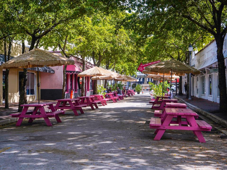 A shaded outdoor dining area in Coconut Grove