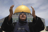 A Palestinian prays during the last Friday prayers of the Muslim holy month of Ramadan at the Dome of the Rock Mosque in the Al Aqsa Mosque compound in the Old City of Jerusalem, Jerusalem, Friday, May 7, 2021. (AP Photo/Mahmoud Illean)