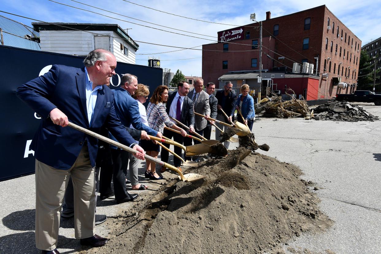 Developers, state and city officials and members of the business community hold a groundbreaking of market-rate apartments Wednesday on the site of the former Mount Carmel Church in Worcester.
