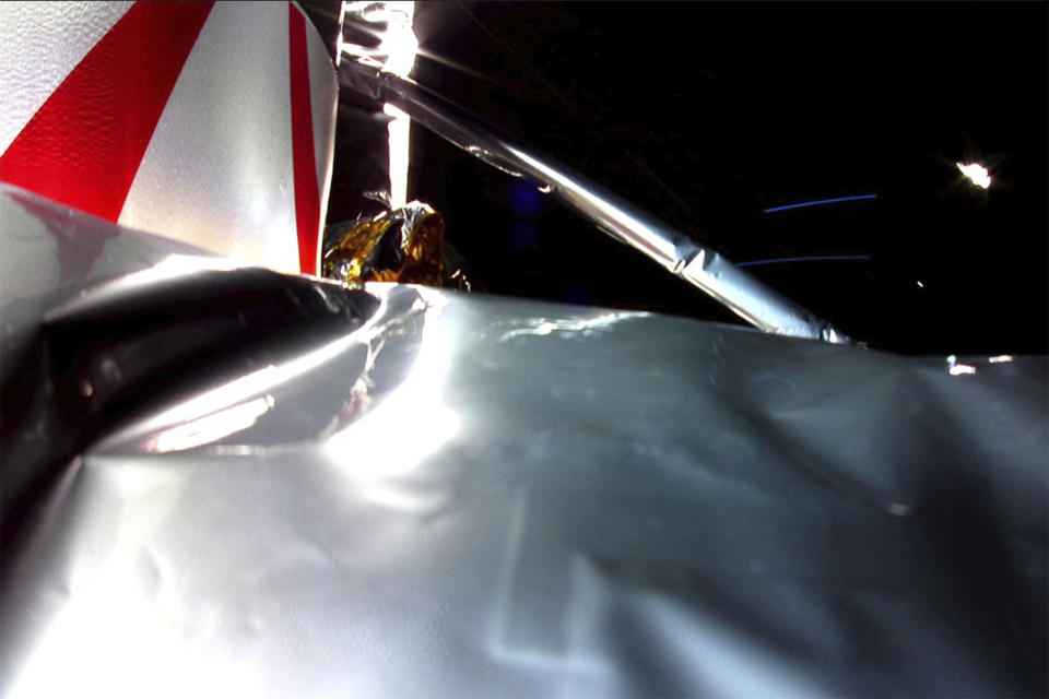 In this image released by Astrobotic Technology, an image from a mounted camera shows a disturbed section of insulation on the Peregrine lander, while on its way to land on the moon, Monday, Jan. 8, 2024. Astrobotic said the moon landing is in jeopardy because of a fuel leak that developed hours after the spacecraft's launch. (Astrobotic Technology via AP)