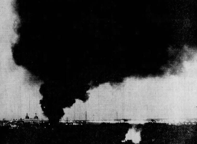 A funnel of dense, black smoke, seen as far away as South Bound Brook, pours from the Guard-Polymer Chemicals Co., Inc., warehouse in Sayreville, on Monday, March 11, 1974.