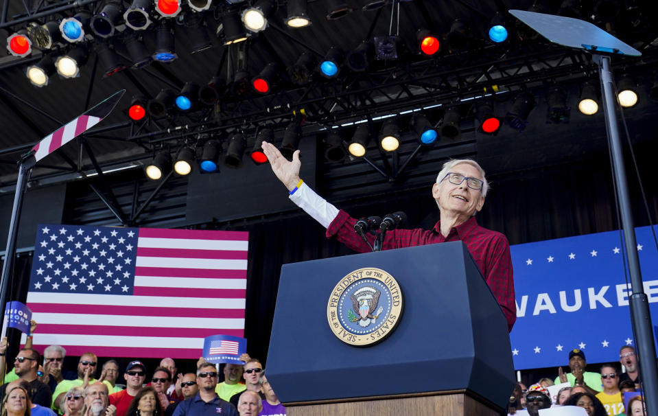 FILE - Wisconsin Gov. Tony Evers speaks during an event at Henry Maier Festival Park in Milwaukee, Sept. 5, 2022. Republican Tim Michels’ recent reversal to support abortion ban exceptions for rape and incest isn't the first time he's shifted ground on a significant issue in his campaign against Gov. Evers. Before that, Michels changed his position on what should be done with the state's bipartisan election commission and also started accepting large campaign donations after saying he wouldn't take any larger than $500. The Democratic incumbent is largely focusing on Michels' abortion shift in hopes of winning a second term. (AP Photo/Susan Walsh, File)