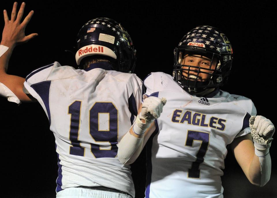 Sterling City's Tristan Himes (7) and Chance Ferguson celebrate after Ferguson's touchdown catch against Westbrook in a Region II-1A Division I final Saturday, Nov. 28, 2020, at Wolf Stadium in Colorado City.