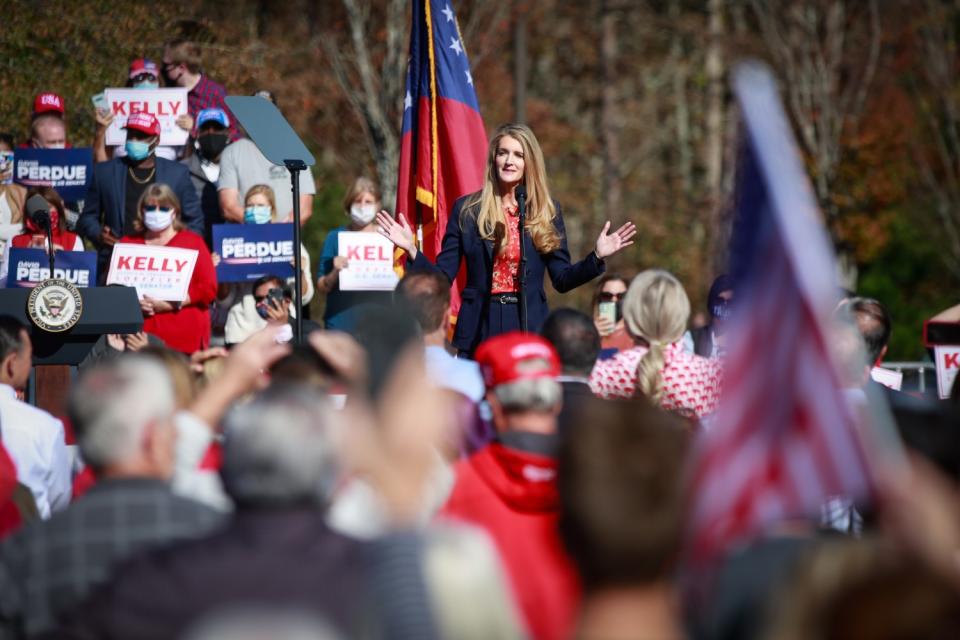 Sen. Kelly Loeffler campaigns for the Jan. 5 runoff election.