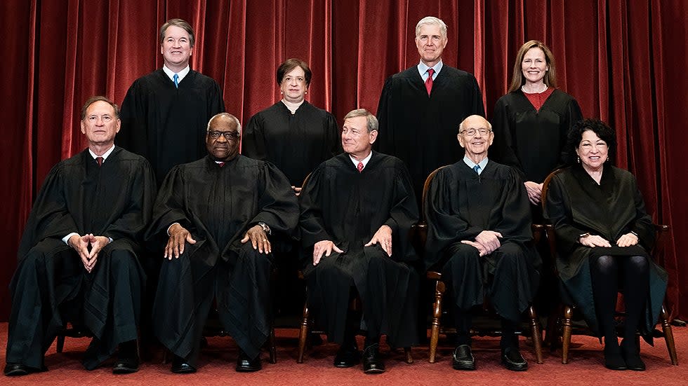 Supreme Court Justices pose for group photo with newly sworn in Justice Amy Coney Barrett on April 23, 2021