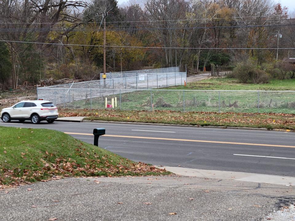 The U.S. Environmental Protection Agency installed a new fence 50 feet closer to the road after methane emissions were detected outside the old fence at the former Industrial Excess Landfill in Lake Township.