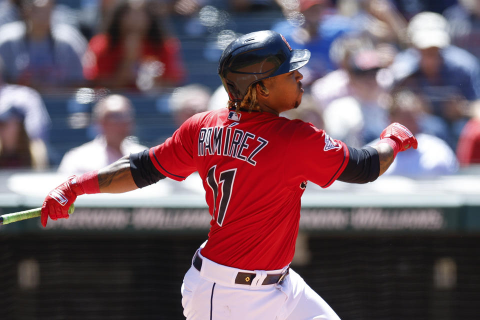 Cleveland Guardians' Jose Ramirez watches his double against the Minnesota Twins during the sixth inning in the first baseball game of a doubleheader, Tuesday, June 28, 2022, in Cleveland. (AP Photo/Ron Schwane)