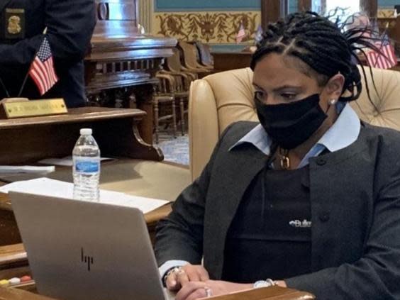 Senator Dayna Polehanki shared on Thursday some colleagues, like Senator Sylvia Santana (pictured), are wearing bulletproof vests to work as armed protesters storm the Michigan State Capitol (Senator Dayna Polehanki)