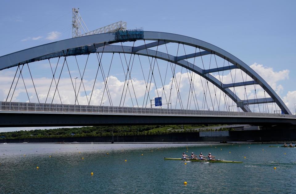 Andrew Reed, Anders Weiss, Michael Grady and Clark Dean (USA) compete on the men's four rowing heats.