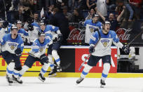 Ice Hockey World Championships - Semifinals - Russia v Finland - Ondrej Nepela Arena, Bratislava, Slovakia - May 25, 2019 Finland's players celebrate after winning the match. REUTERS/David W Cerny