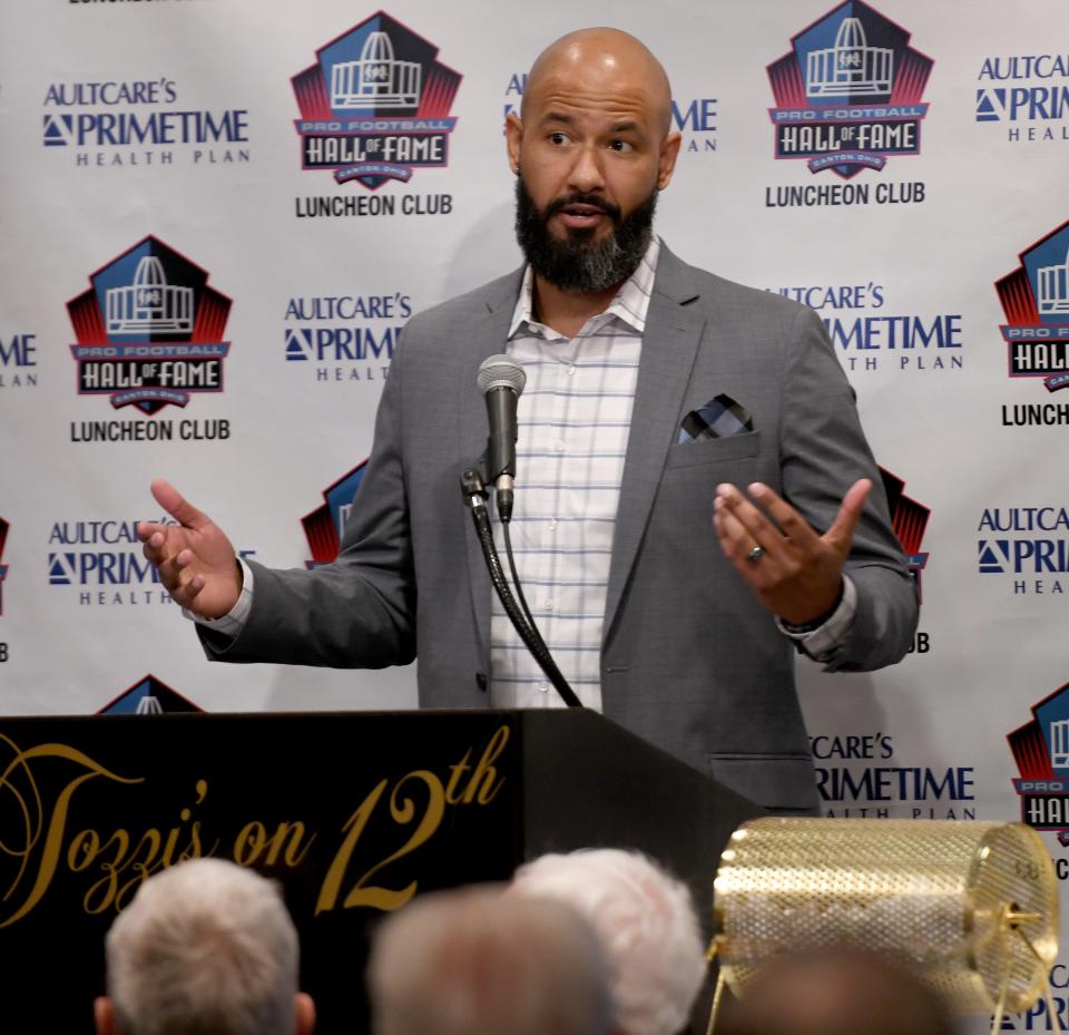 Joe Dose, grandson of Pro Football Hall of Famer Marion Motley, speaks at the Pro Football Hall of Fame Luncheon Club, Monday, March 20, 2023.