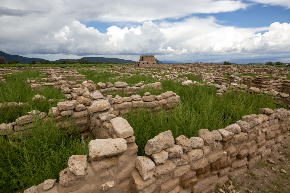 An early Santa Clara Pueblo structure sits on the mesa top at the Puye Cliff Dwellings in northern New Mexico, Monday, Aug. 22, 2022. The tribe lived there until drought forced them to move to the Rio Grande Valley about 500 years ago. (AP Photo/Andres Leighton)