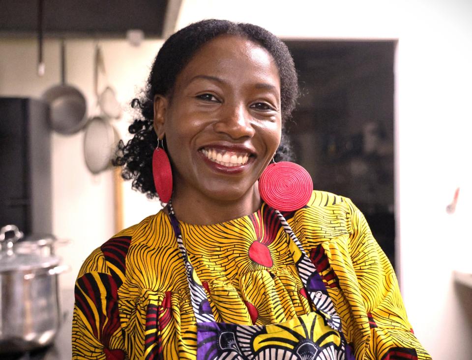 Charity Abban-Saah poses in the kitchen at her restaurant in Redding, Amazing Alheri, where she and her helpers prepared West African cuisine on Feb. 17, 2024.