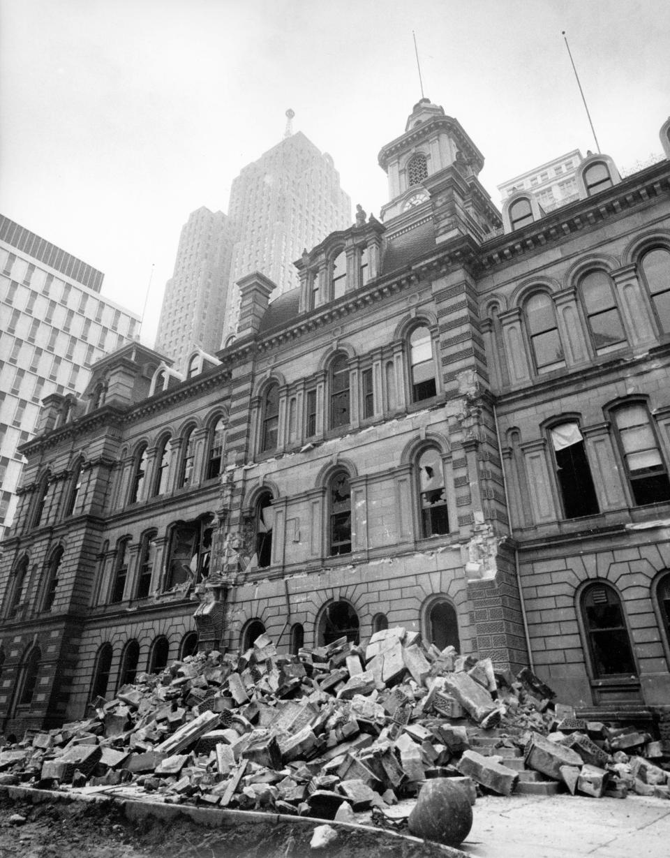 A view of the front steps and upper balcony during the demolition of Old City Hall in 1961.