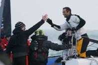 French skipper Armel Le Cleac'h (R) reacts after he won the solo round-the-world Vendee Globe sailing race, in the waters off Les Sables d'Olonne on France's Atlantic coast January 19, 2017. REUTERS/Regis Duvignau