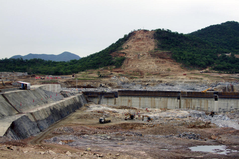 FILE - This June 28, 2013 file photo, shows construction work at the site of the planned Grand Ethiopian Renaissance Dam near Assosa in the Benishangul-Gumuz region of Ethiopia, near Sudan, some 800 kilometers (500 miles) from the capital Addis Ababa. Egypt wants the United Nations Security Council to "undertake its responsibilities" and prevent Ethiopia from starting to fill its massive, newly built hydroelectric dam on the Nile River next month amid a breakdown in negotiations, Egyptian Foreign Minister Sameh Shukry told The Associated Press on Sunday, June 21, 2020 accusing Ethiopian officials of stoking antagonism between the countries. (AP Photo/Elias Asmare, File)