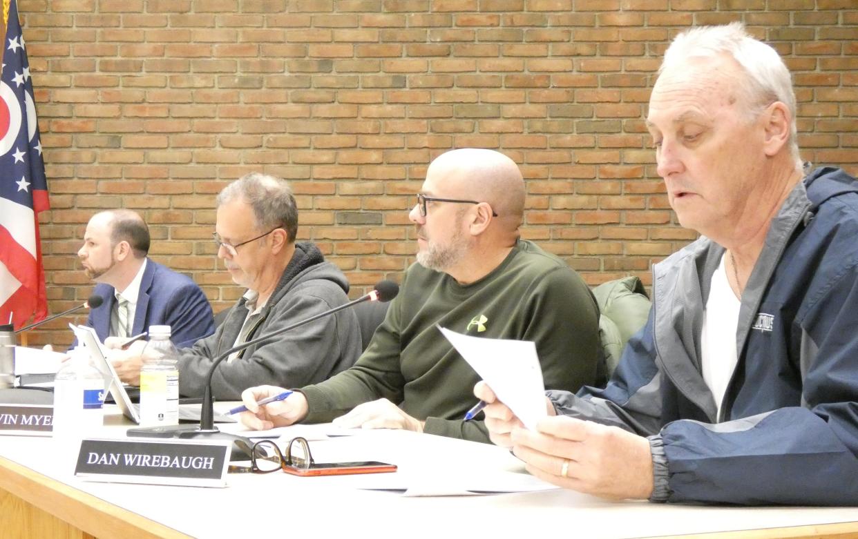 Members of the Bucyrus City Council Finance Committee discuss the possibility of opening the Aumiller Park Pool on Thursday evening. From left are Brian Gernert, interim city law director; Mark Makeever, Kevin Myers and Dan Wirebaugh.