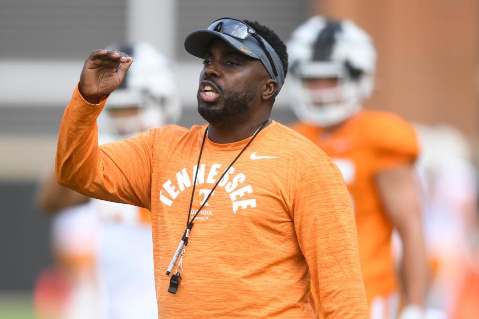 Defensive coordinator Tim Banks coaches players during a drill during Tennessee Football’s first fall practice, Wednesday, Aug. 2, 2023.