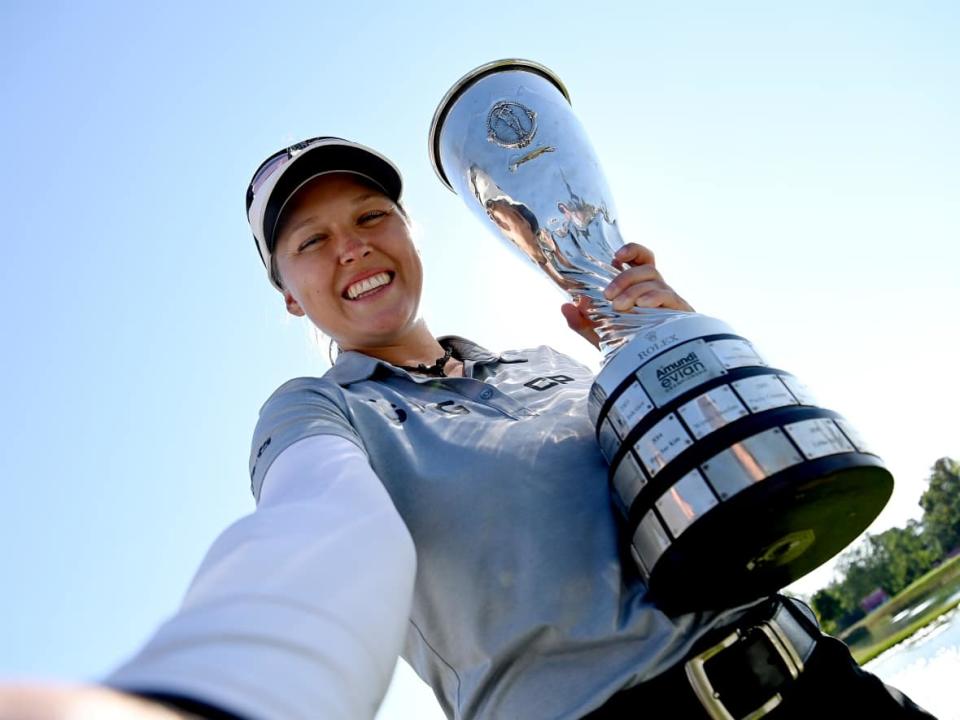 Canada's Brooke Henderson celebrates her victory at the Evian Championship in July. She'll go for her third career major when the Women's British Open begins on Thursday. (Stuart Franklin/Getty Images - image credit)