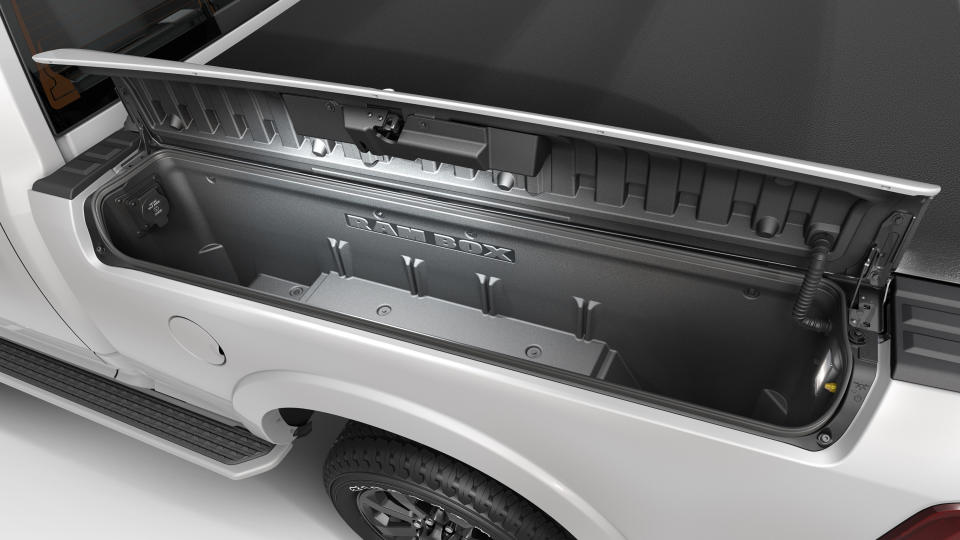 This undated photo provided by Fiat Chrysler shows the 2020 Ram 2500 equipped with the RamBox lockable compartments. When it comes to full-size trucks, the Ram 1500 crew cab and its heavy-duty variants including 2500 and 3500 are the reigning kings of clever storage. The model that debuted in 2018 comes standard with a center console that’s both spacious and configurable. (Courtesy of FCA US LLC via AP)