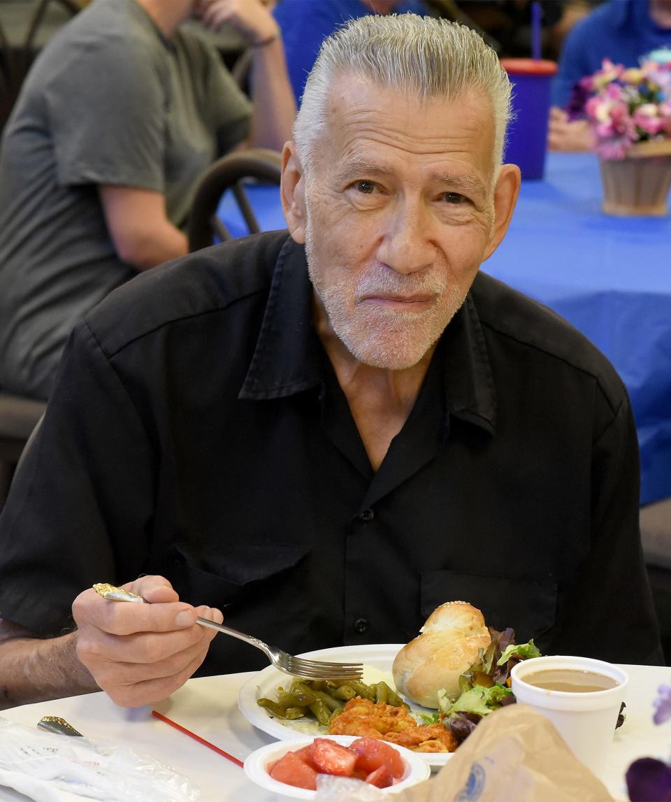 Richard Vancena, 82 of Monroe was one of the diners at Friday's God Works meal at St. Mary Catholic Church. Vancena learned about the meals a few months ago and enjoys attending to see friends he met there.
