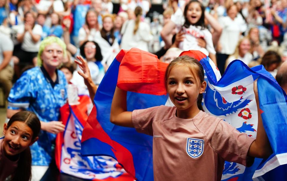 England fans celebrate the opening goal during a screening of the FIFA Women's World Cup 2023 semi-final between Australia and England at BOXPARK Wembley, London (PA)