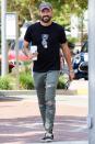<p>Brian Austin Green flashes a smile while out picking up coffee from Starbucks in Malibu on Wednesday.</p>