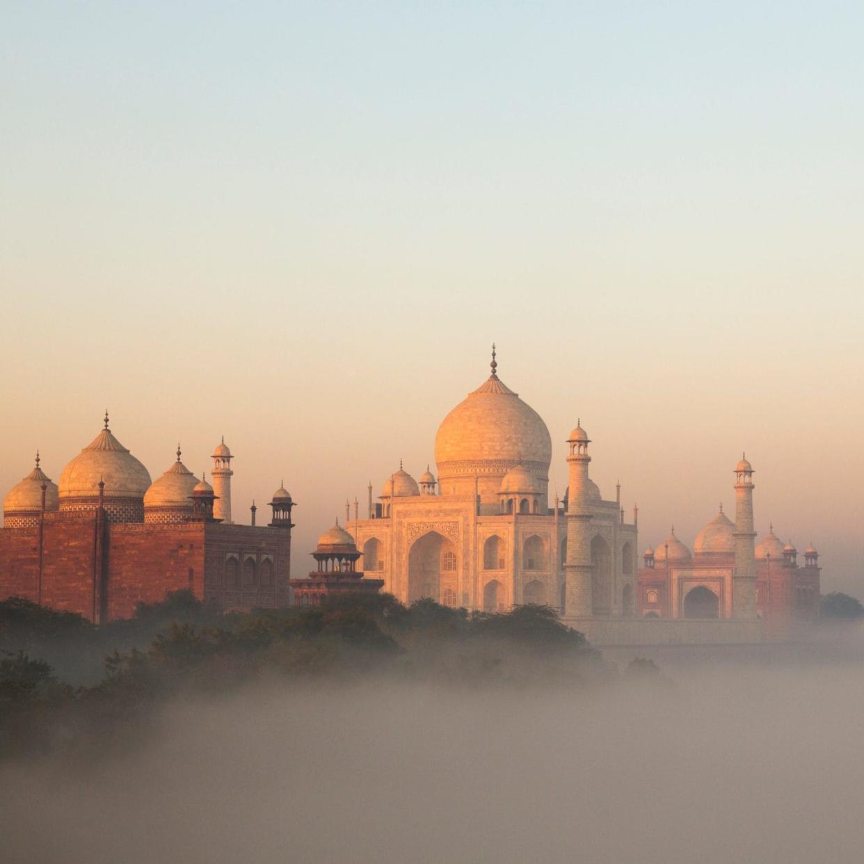 Early morning fog envelopes the Taj Mahal - Adrian Pope