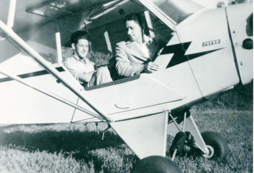 Paul and Francis Bergeron in their Piper Cub. The Civil Aeronautics Board suggested Exeter as a potential site for an airport in the 1940s. The Bergerons started to build a potential airstrip on the former Wadleigh Farm on Linden Street, but the neighbors objected and the project was dropped.