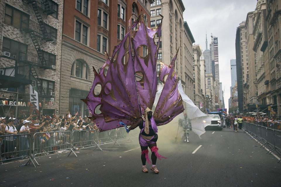 A reveler marches along Fifth Avenue during the Pride March, in New York, June 30, 2024. (AP Photo/ Andres Kudacki)