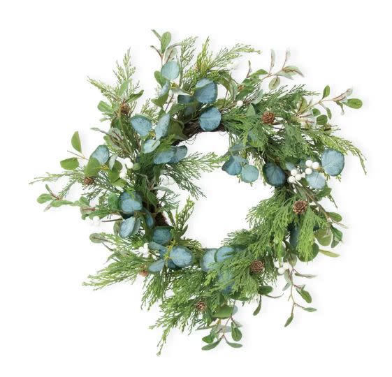 <strong><a href="https://www.wayfair.com/decor-pillows/pdp/the-holiday-aisle-evergreen-and-eucalyptus-20-plastic-wreath-bcst2423.html?ds=142116" target="_blank" rel="noopener noreferrer">Get it at Wayfair</a></strong>, $38.&nbsp;