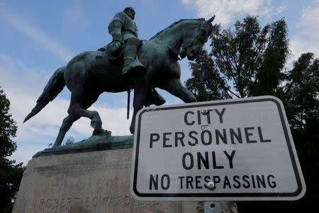 A statue of Civil War Confederate General Robert E. Lee stands in a park, ahead the one-year anniversary of the fatal white-nationalist rally, in Charlottesville, Virginia, U.S., August 1, 2018. REUTERS/Brian Snyder