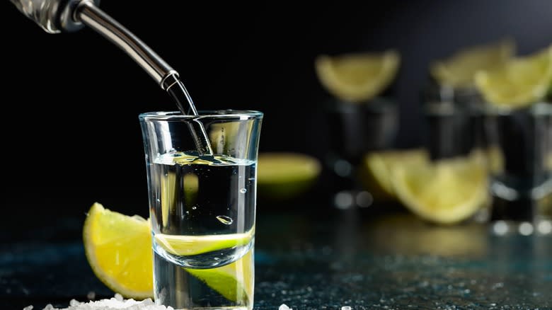 Tequila pouring into shot glass