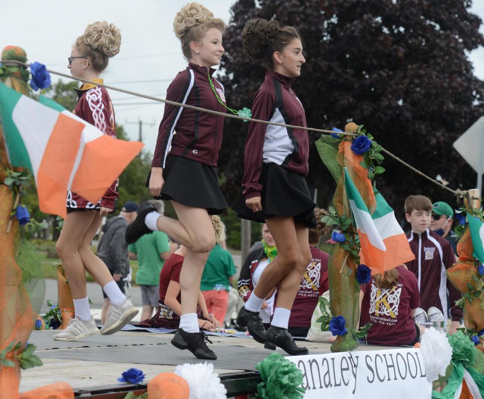 Dancers with the Kanaley School of Irish Dance entertain the crowd on their float at the annual St. Patrick's Parade, which was delayed to September in 2021 because of COVID-19.