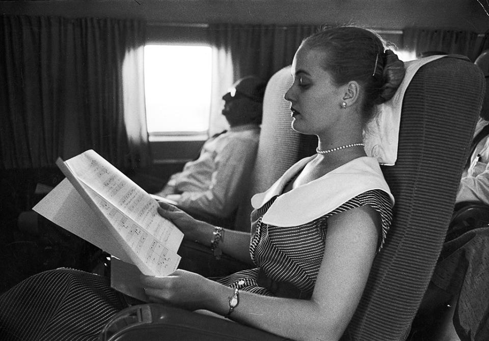 <p>Actress Florence Henderson flying from New York to Kentucky reading and studying music for her next musical ‘Fanny’, 1954. (Photo by Esther Bubley/The LIFE Images Collection/Getty Images) </p>