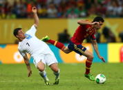 RECIFE, BRAZIL - JUNE 16: Alvaro Arbeloa of Spain evades Cristian Rodriguez of Uruguay during the FIFA Confederations Cup Brazil 2013 Group B match between Spain and Uruguay at the Arena Pernambuco on June 16, 2013 in Recife, Brazil. (Photo by Clive Mason/Getty Images)