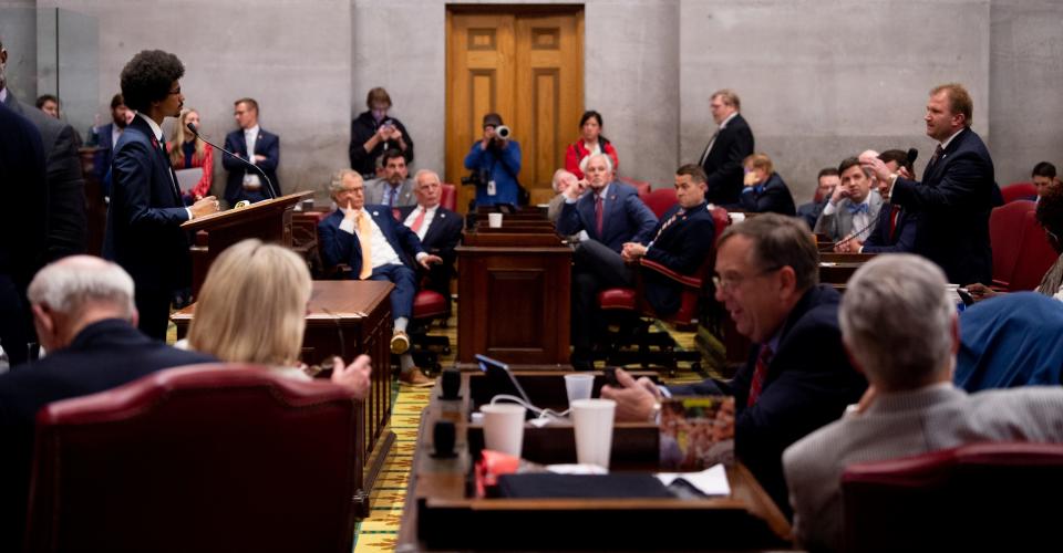 Justin Pearson, D-Memphis, listens to a question from William Lamberth, R-Portland, before a vote to expel him form the House of Representatives at the Tennessee State Capitol in Nashville, Tenn., on Thursday, April 6, 2023. 