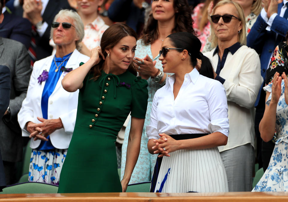 The Duchess of Cambridge and The Duchess of Sussex on day twelve of the Wimbledon Championships at the All England Lawn Tennis and Croquet Club, Wimbledon.