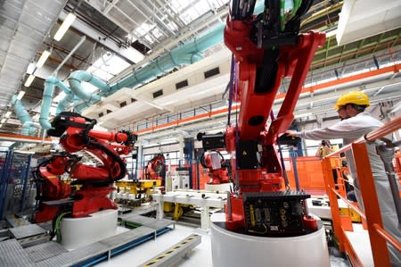 Ceremony to mark the installation of the first robot on the production line for the new electric Fiat 500 BEV at the Mirafiori industrial complex on the 80th birthday of the plant